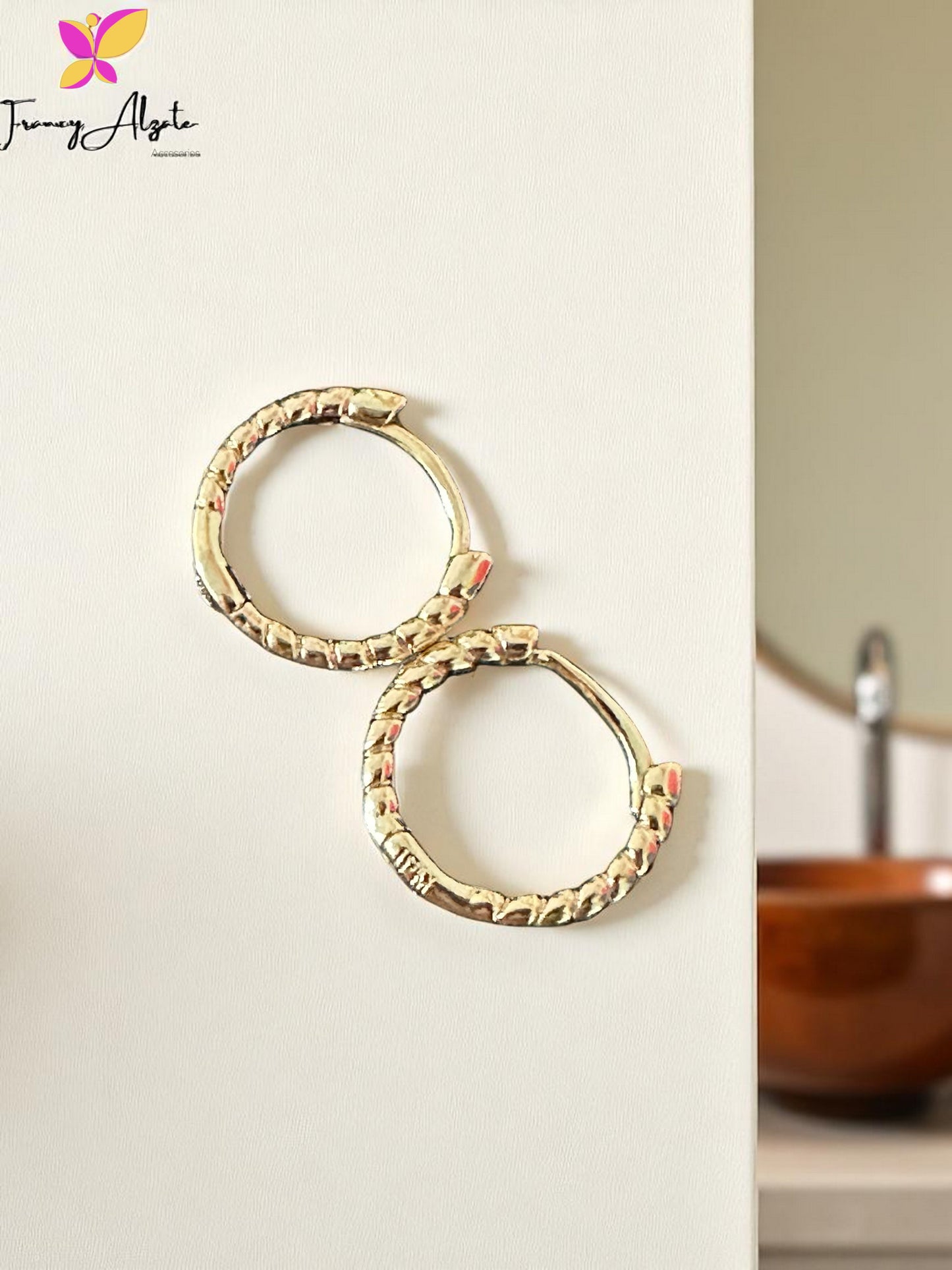 Candongas click entorchada oro laminado 18k