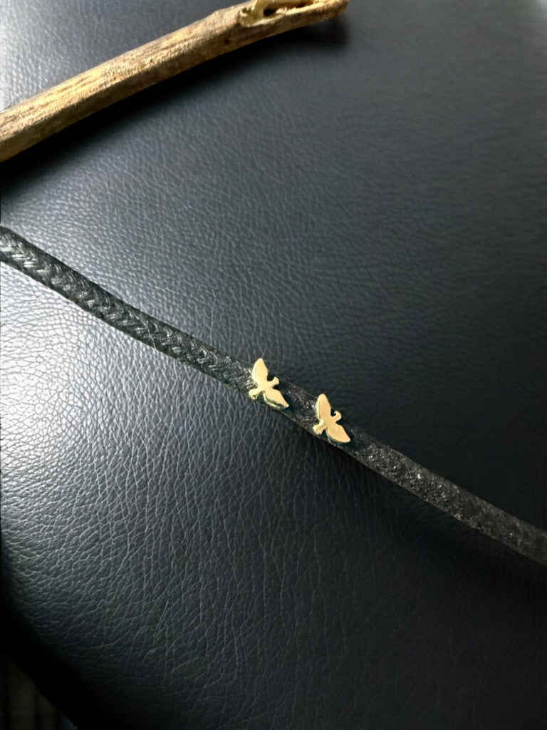 Minitopo Espíritu Santo liso en oro laminado 18K