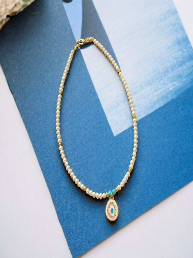 Choker de perla shell y centro ojo turco