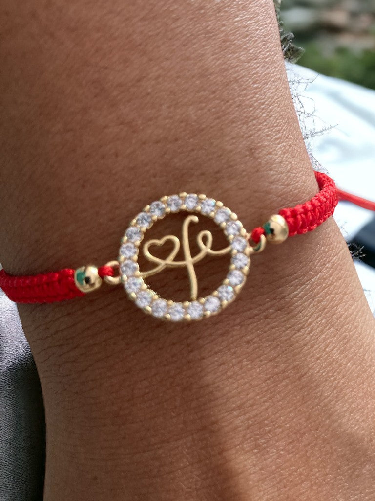 Pulsera tejida centro fe oro laminado 18k