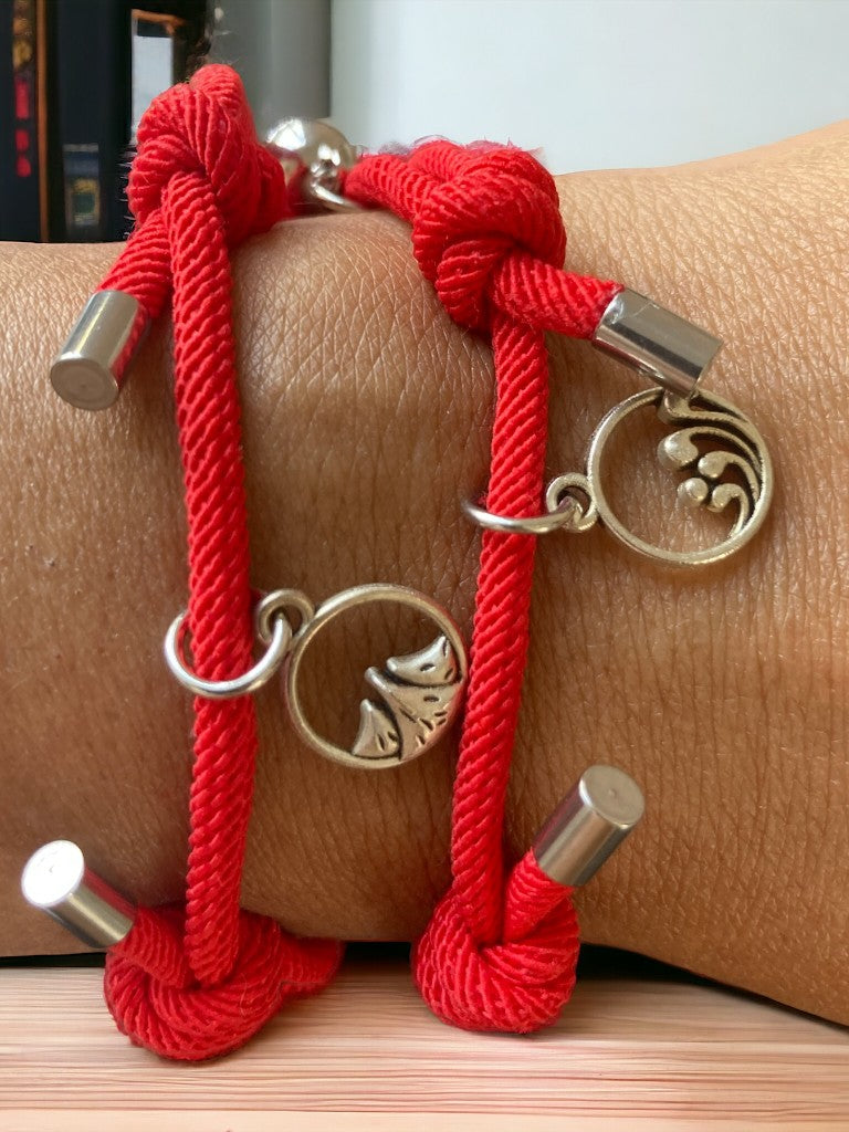 Set de pulseras rojas arena y mar broche redondo