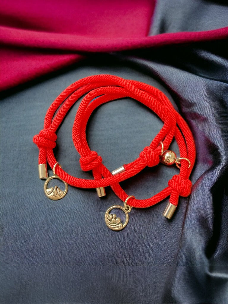 Set de pulseras rojas arena y mar broche redondo