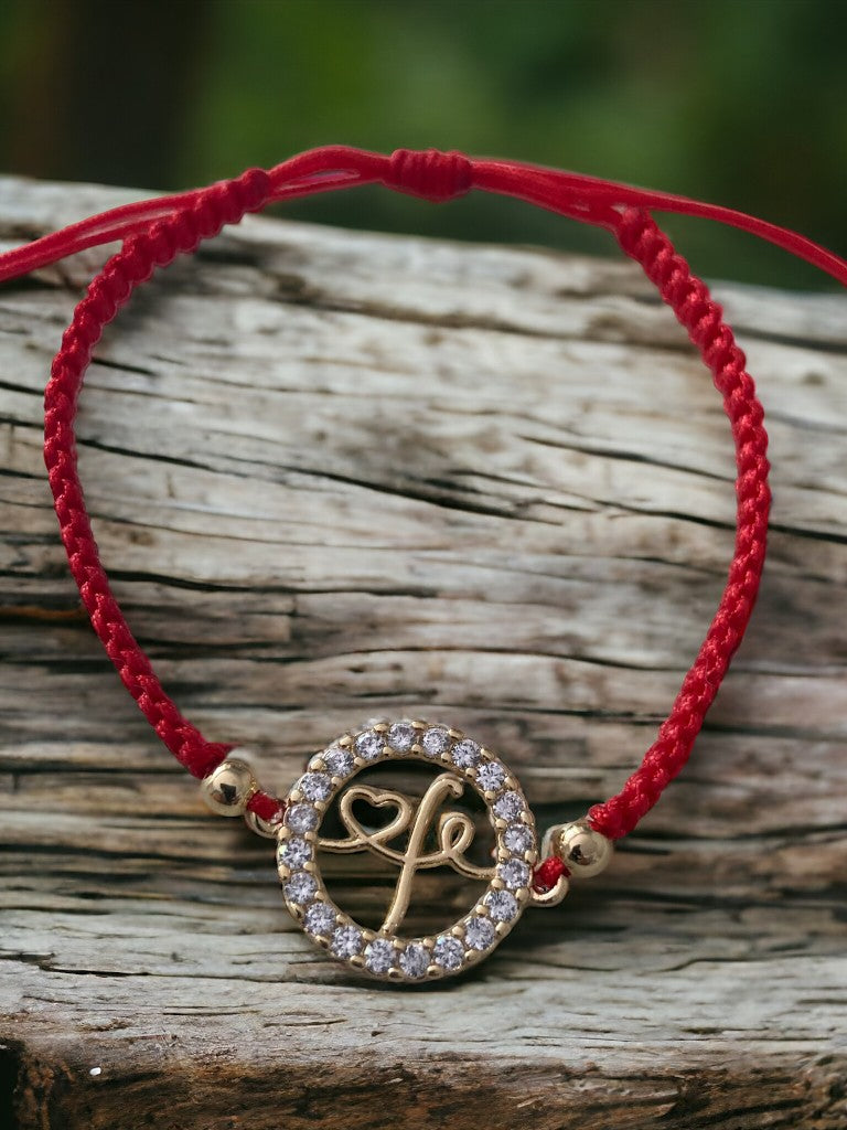 Pulsera tejida centro fe oro laminado 18k