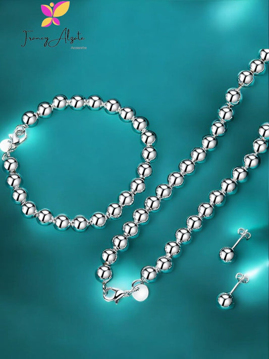 Set de collar, aretes y pulsera  con balines