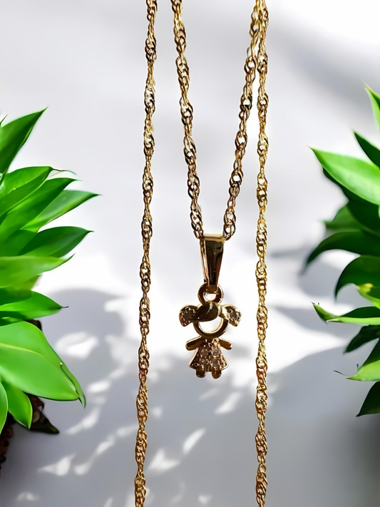 Dije niña  oro laminado 18k