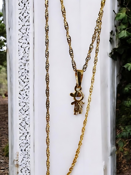 Dije niño oro laminado 18k