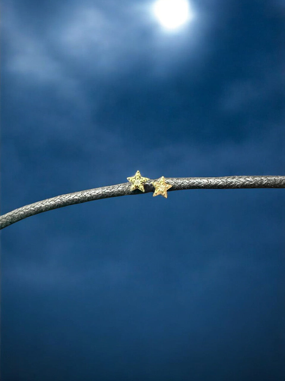 Topo estrella circón en oro laminado 18k