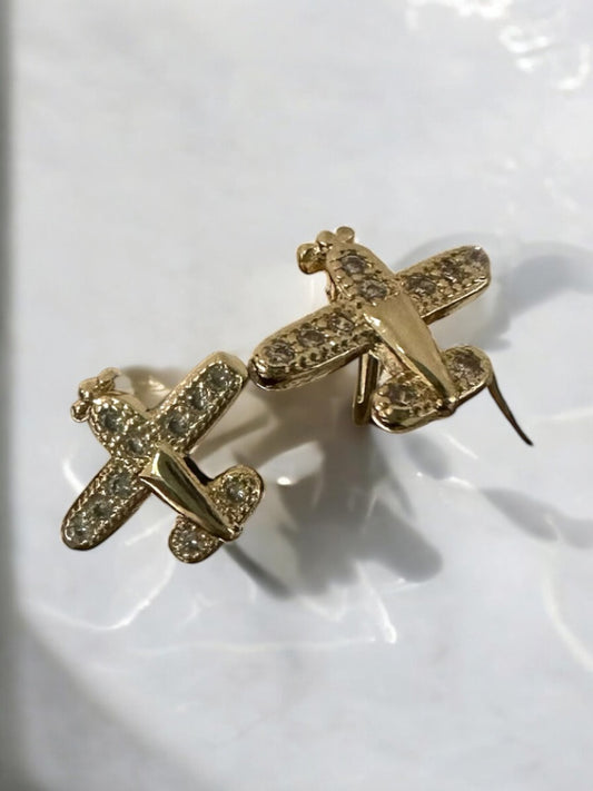 Topos avión circón en oro laminado 18k
